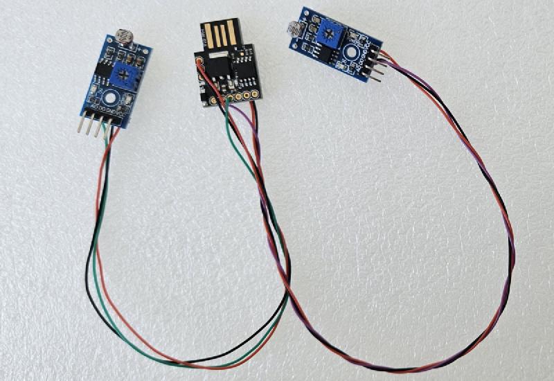 Digispark ATtiny85 wired to two LM393 LDR sensor boards